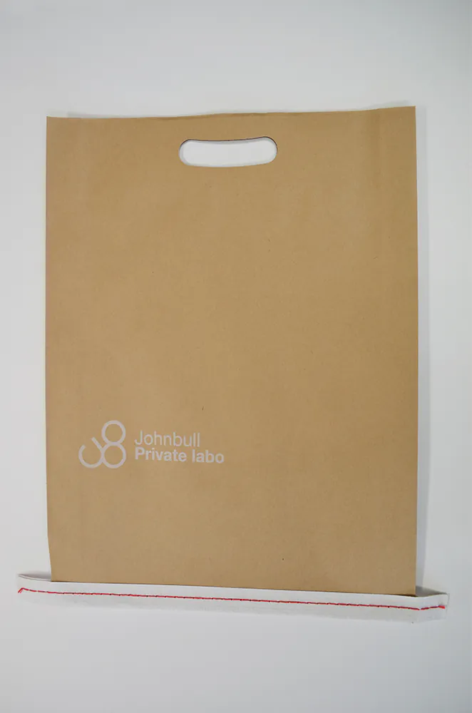 小判型手穴の手提げ袋を読む