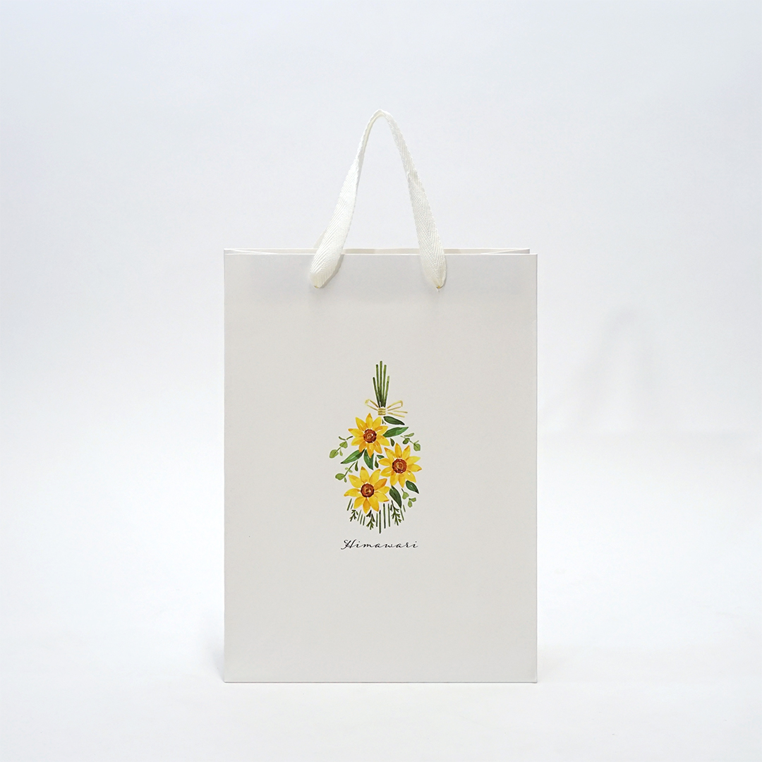 ひまわりの花が印刷された優しげな雰囲気の工務店の紙袋0