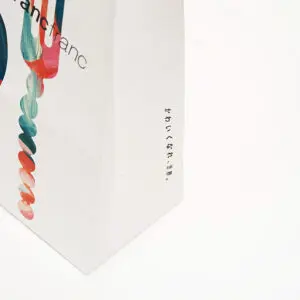 人気インテリアショップのスプーンとフォークのカラフルなイラストが、フルカラー印刷で再現された、アートのようなオリジナル紙袋