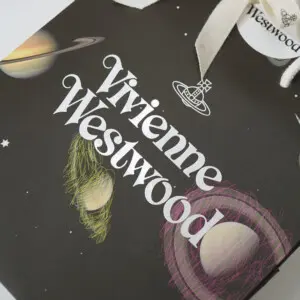 天体のイラストがフルカラー印刷された、イギリス発アパレルブランドの神秘的でロックなオリジナル紙袋