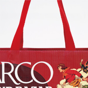 アクリル平紐を使用した縦留め仕様のハンドルが付いた、「パプリカ」20周年×PARCOのオリジナル紙袋