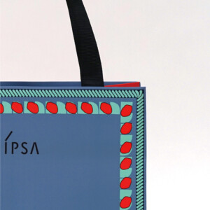 3本の帯が額縁のようにデザインされたオリジナル紙袋